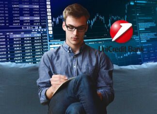 trader che prende appunti e logo Unicredit