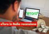 eToro recensione ufficiale 2026 e opinioni. Come funziona in Italia trader che investe con pc con logo di eToro