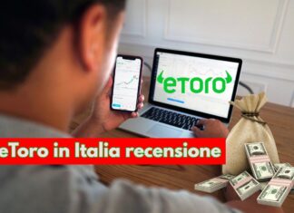trader che investe con pc con logo di eToro