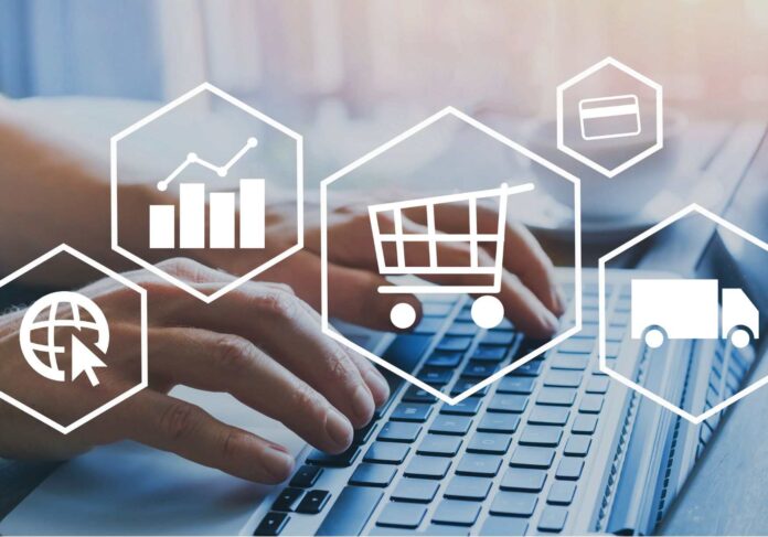 e-commerce-inflazione-risparmio tastiera pc con simboli e-commerce