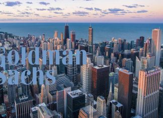 grattacieli finanziari e logo di Goldman Sachs