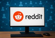 Azioni Reddit: upside goloso, cosa fare in borsa? desktop con logo Reddit e community interconnessa