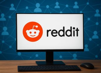 desktop con logo Reddit e community interconnessa