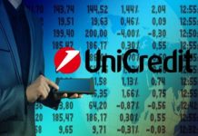 Obbligazioni Unicredit At1: cedola 5,8% sotto guidance, boom ordini trader con tablet in mano
