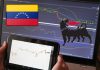 chart di trading e bandiera del Venezuela