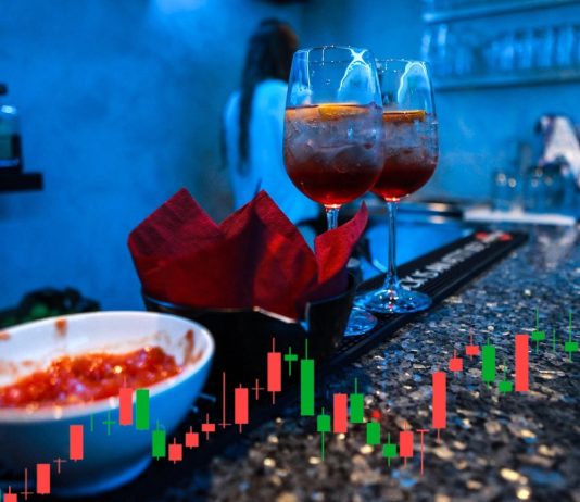 bicchiere drink e grafico a candele