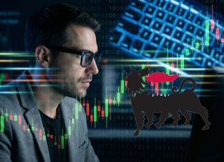 trader che analizza e logo Eni