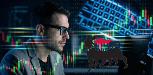 trader che analizza e logo Eni