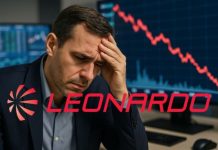 trader pensoso e grafico al ribasso