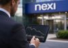 insegna Nexi e investitore