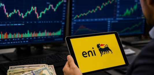 logo Eni sui tablet e dollari accanto
