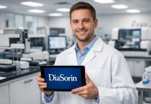 Piano industriale Diasorin 2030: cosa prevede e reazione azioni tecnico diagnosi con tablet con logo diasorin