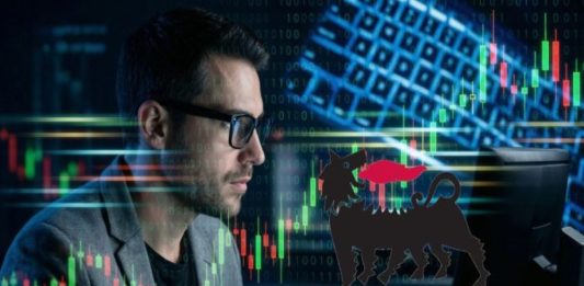 trader che analizza grafico a candele