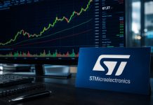 grafico borsa e desktop con insegna STM