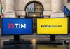 desktop con loghi Poste e TIM