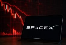 grafico in ribasso e logo SpaceX su tablet