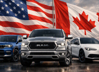 auto della casa Stellantis con bandiera Usa e Canada